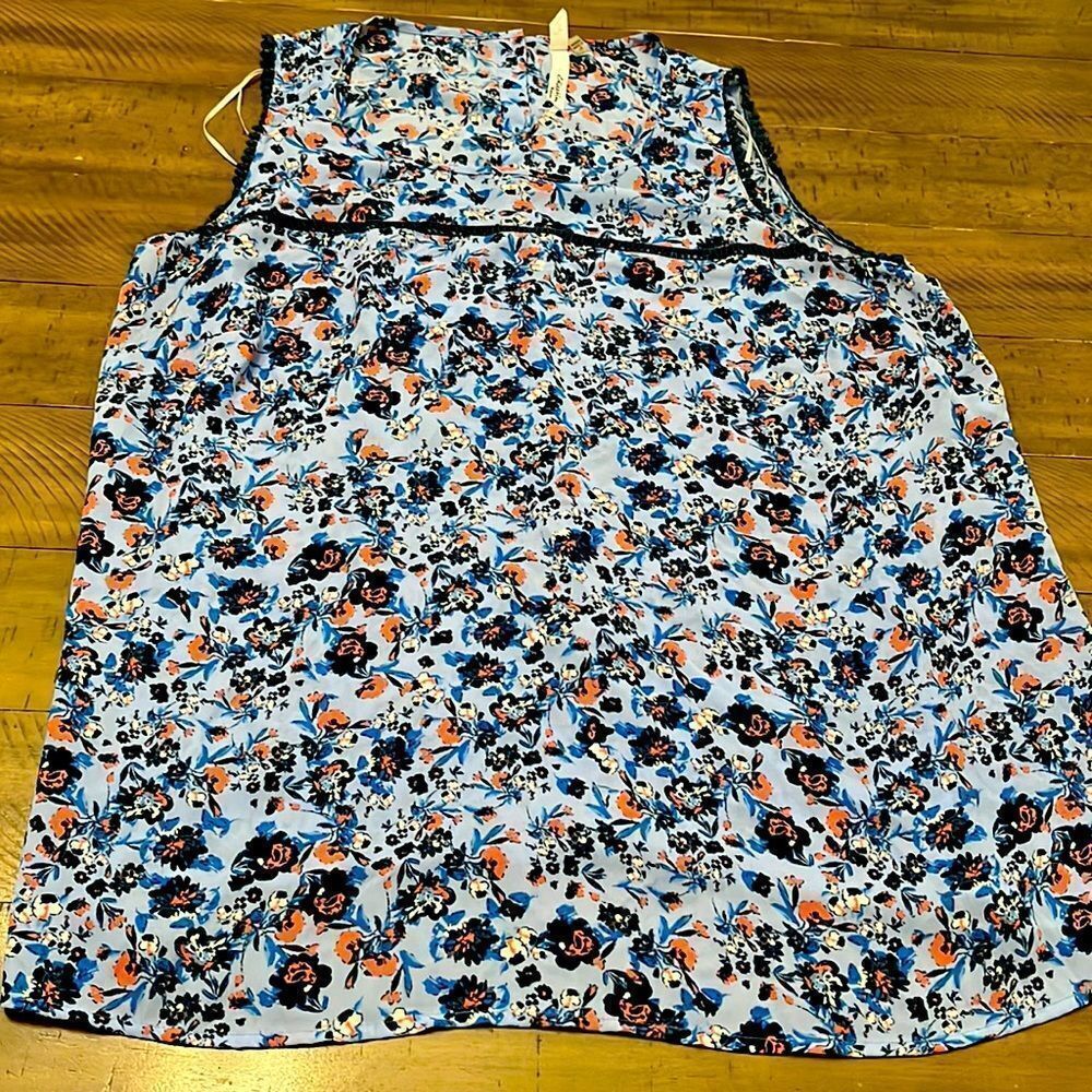 Floral sleeveless top with buttons down the back